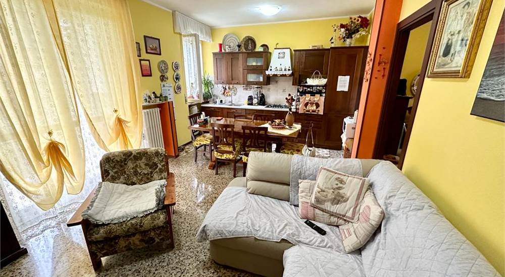 Soggiorno con cucina a vista