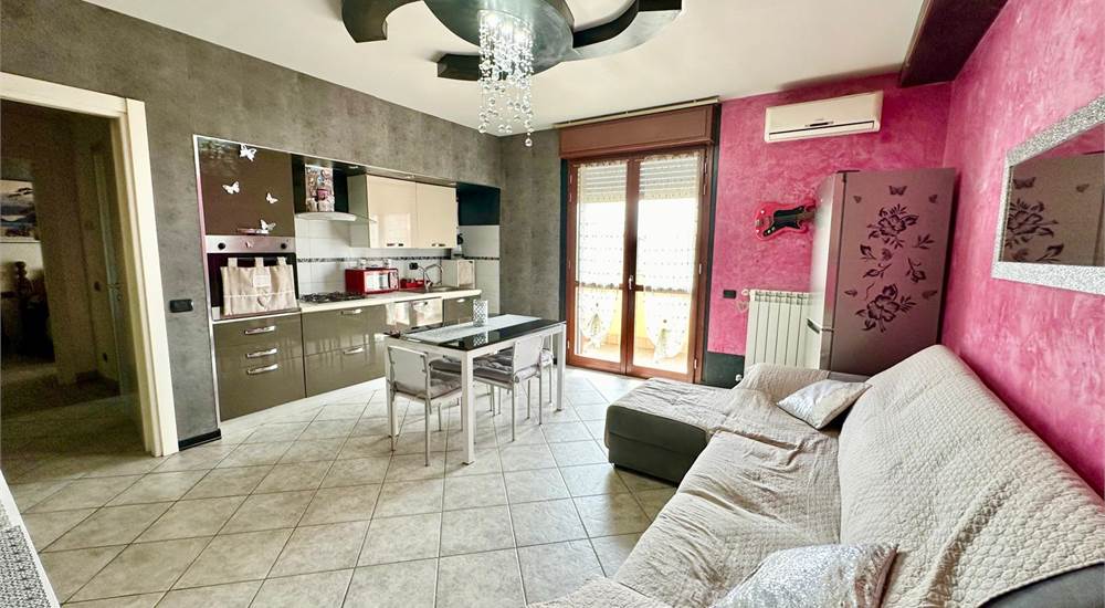 Soggiorno con cucina a vista